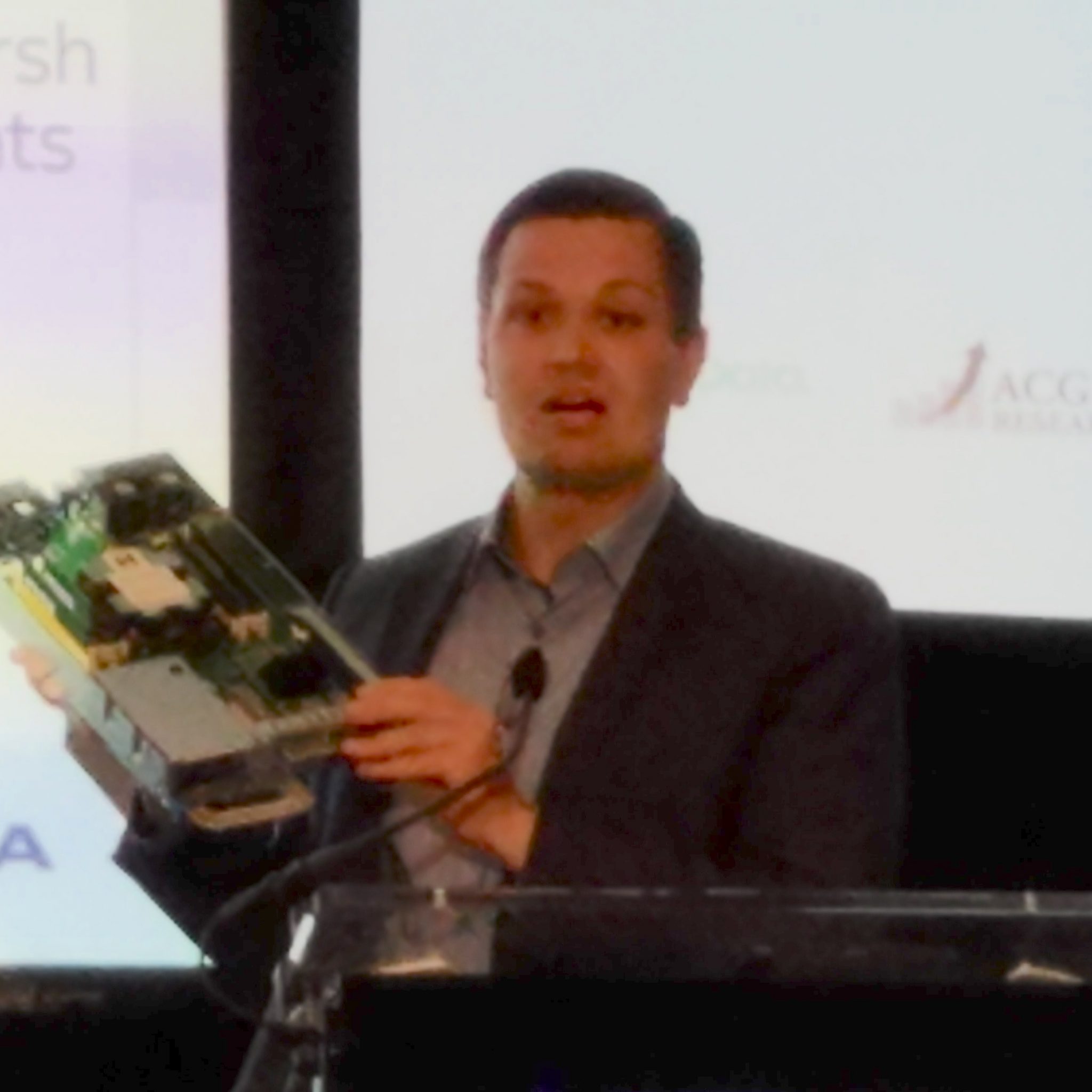 Nokia CTO and head of R&D Foundation, Mobile Networks Henri Tervonen holds AirFrame Open Edge at NVF-Zero Touch, April 25, 2018. (Bad cell phone image courtesy of Susan Rambo, RCR Wireless)