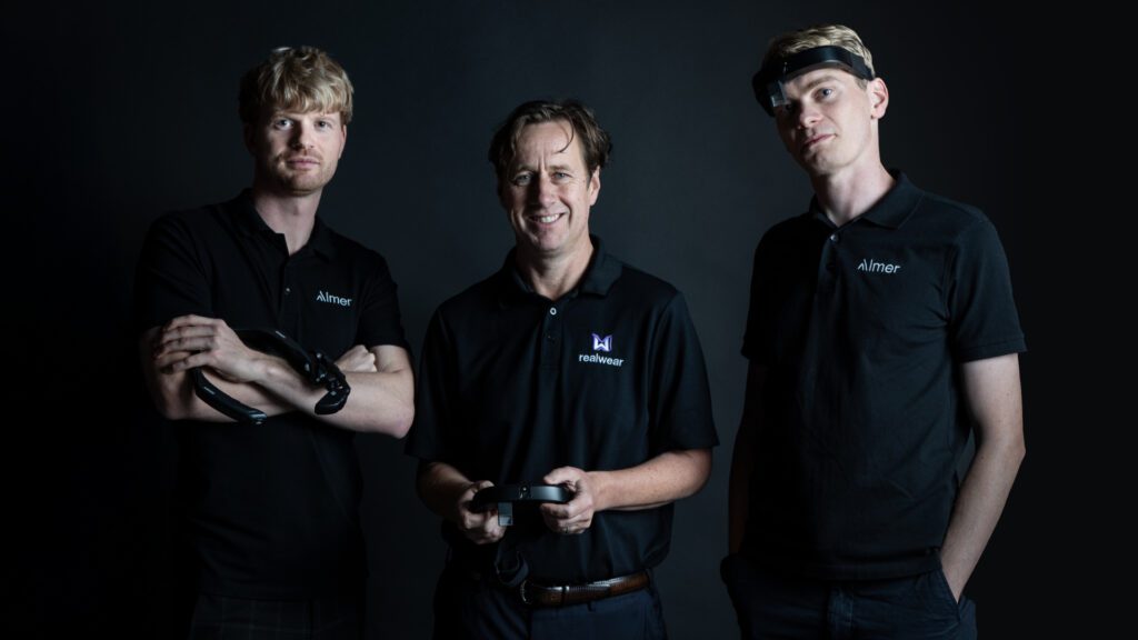 RealWear buys Almer in bid to ‘reshape the industrial AR market’ 6 Almer founders Timon Binder and Sebastian Beetschen flank CEO of RealWear Dr Chris Parkinson11